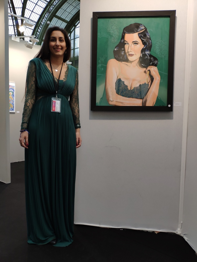 Posing in my viridian dress next to my green painting of Dita von Teese